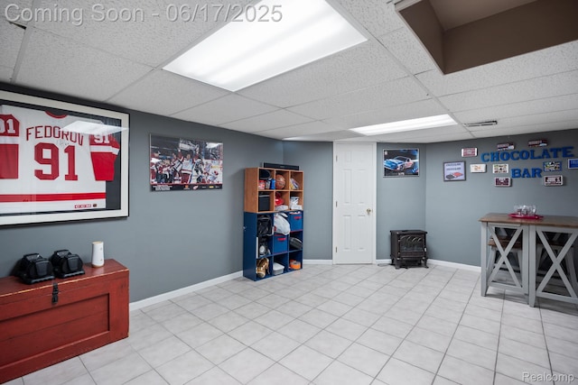 24462 Christian Dr, Flat Rock, MI 48134 - playroom featuring a drop ceiling and a wood stove