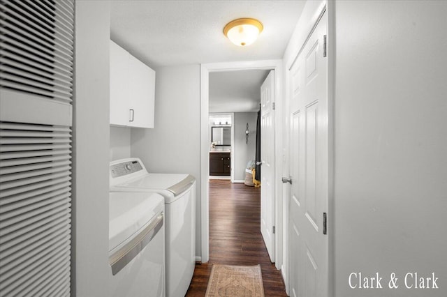 1873 Veronica St SE, Lowell, MI 49331 - washroom with separate washer and dryer, dark wood-type flooring, cabinet space, and a heating unit