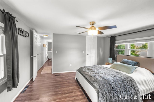 1873 Veronica St SE, Lowell, MI 49331 - bedroom featuring dark wood finished floors and ceiling fan