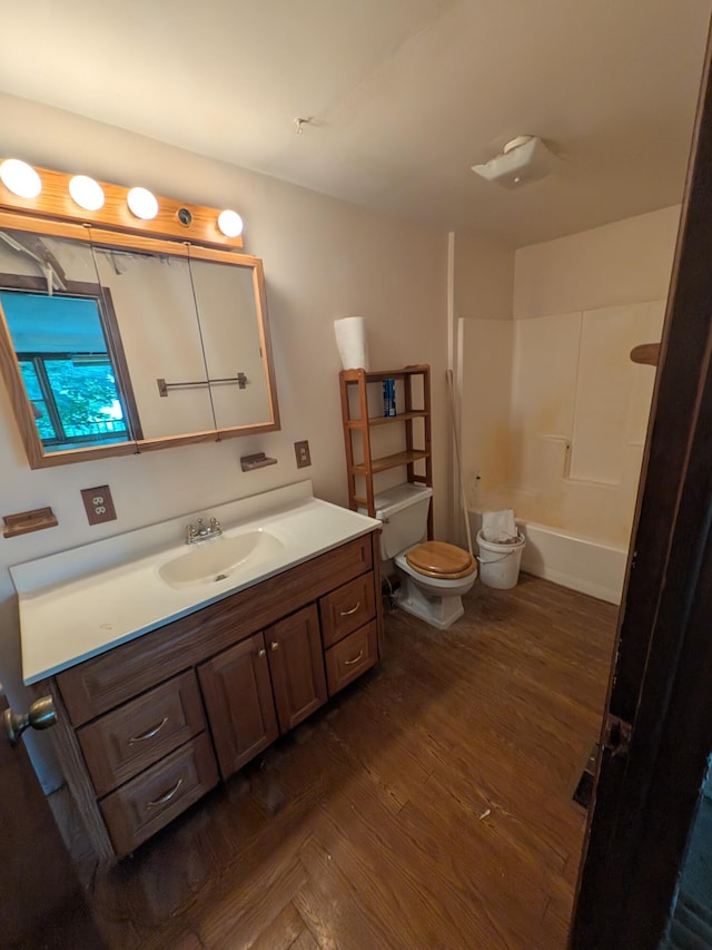 4989 W Jordan Rd, Weidman, MI 48893 - bathroom with vanity, wood finished floors, and bathtub / shower combination