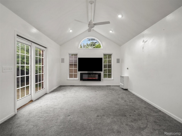 1930 Kenmore Dr, Grosse Pointe Woods, MI 48236 - unfurnished living room featuring a ceiling fan, carpet flooring, lofted ceiling, a glass covered fireplace, and heating unit