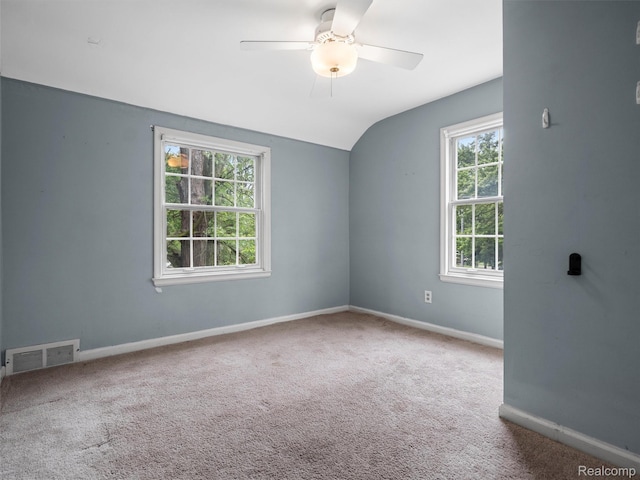 1930 Kenmore Dr, Grosse Pointe Woods, MI 48236 - carpeted empty room with ceiling fan and vaulted ceiling
