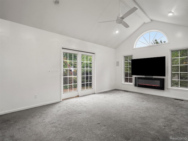 1930 Kenmore Dr, Grosse Pointe Woods, MI 48236 - unfurnished living room with beam ceiling, carpet floors, ceiling fan, a glass covered fireplace, and high vaulted ceiling