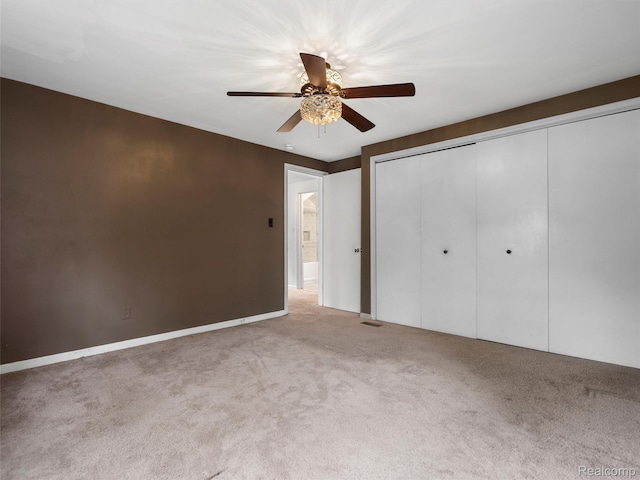 1930 Kenmore Dr, Grosse Pointe Woods, MI 48236 - unfurnished bedroom with carpet floors, a closet, and a ceiling fan