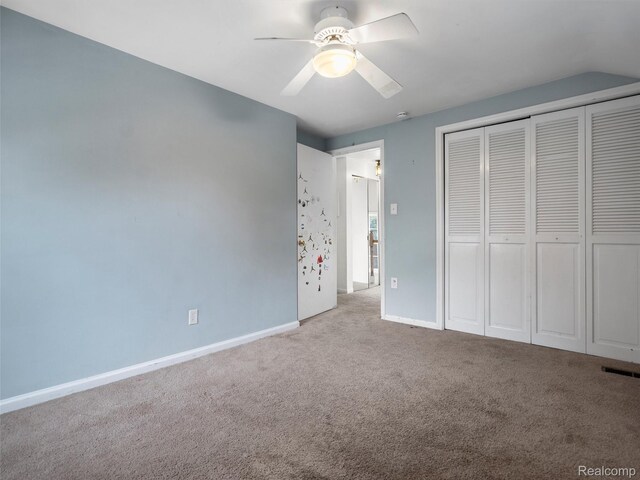 1930 Kenmore Dr, Grosse Pointe Woods, MI 48236 - unfurnished bedroom featuring carpet floors, a closet, and ceiling fan
