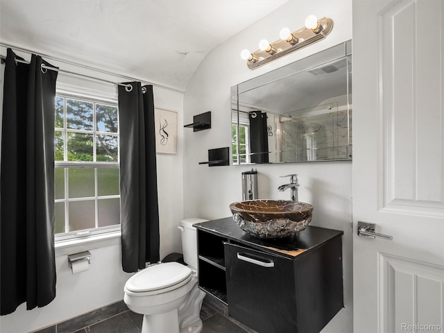 1930 Kenmore Dr, Grosse Pointe Woods, MI 48236 - bathroom with vanity, tile patterned flooring, a shower, and vaulted ceiling