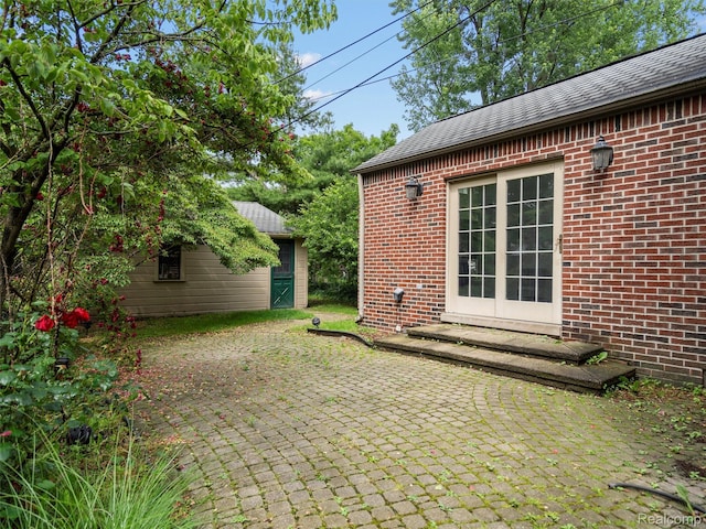 1930 Kenmore Dr, Grosse Pointe Woods, MI 48236 - view of patio / terrace with an outbuilding