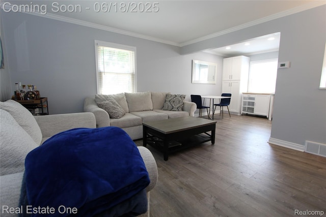 1670 Graefield Rd, Birmingham, MI 48009 - living area with ornamental molding, dark wood-type flooring, and recessed lighting
