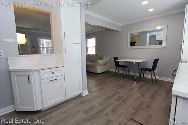 1670 Graefield Rd, Birmingham, MI 48009 - dining room with ornamental molding, healthy amount of natural light, dark wood-style floors, and recessed lighting