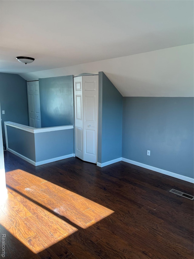44 Pleasantview Dr, Pontiac, MI 48341 - bonus room featuring dark wood-type flooring and lofted ceiling