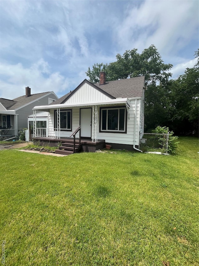 44 Pleasantview Dr, Pontiac, MI 48341 - view of front of property featuring a chimney, board and batten siding, a porch, and a shingled roof