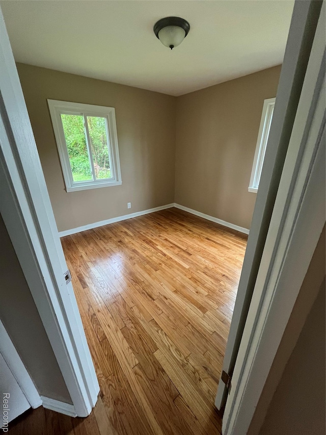44 Pleasantview Dr, Pontiac, MI 48341 - empty room with wood-type flooring and baseboards