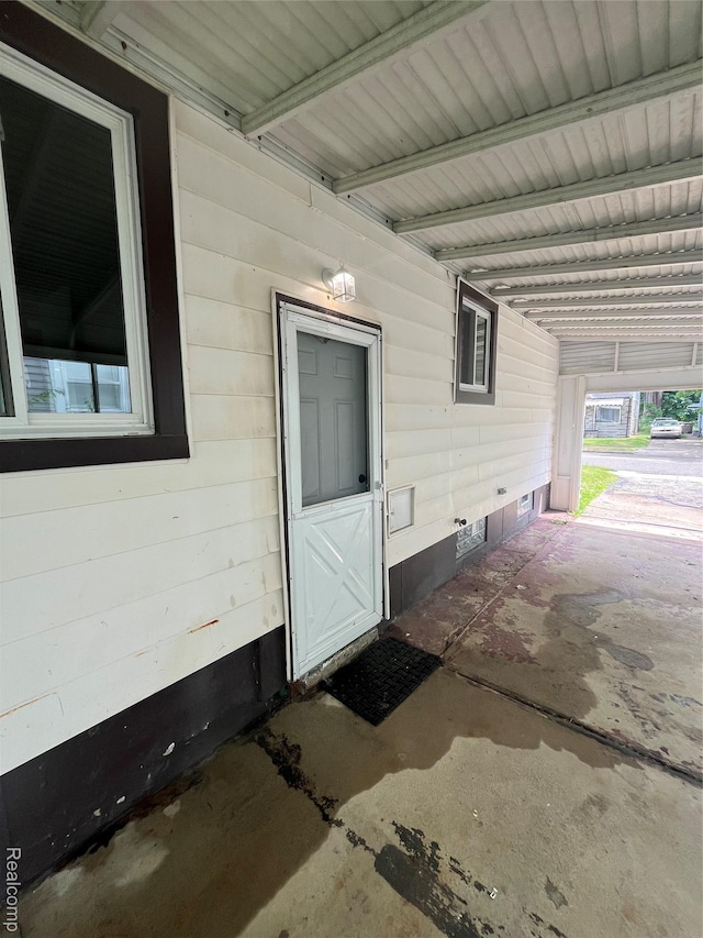 44 Pleasantview Dr, Pontiac, MI 48341 - view of exterior entry with an attached carport