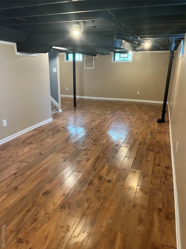 44 Pleasantview Dr, Pontiac, MI 48341 - basement with hardwood / wood-style floors and stairway
