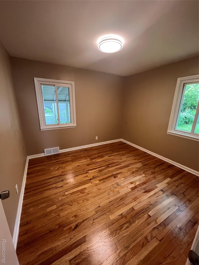 44 Pleasantview Dr, Pontiac, MI 48341 - unfurnished room featuring wood-type flooring and baseboards
