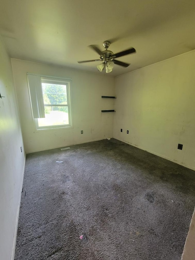 14300 Tuttlehill, Milan, MI 48160 - carpeted spare room featuring a ceiling fan