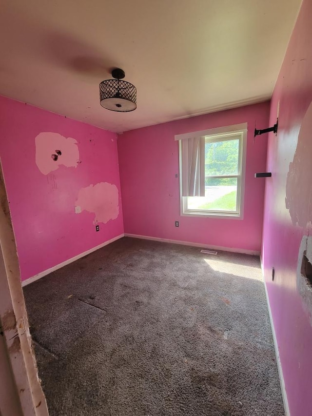 14300 Tuttlehill, Milan, MI 48160 - carpeted spare room featuring baseboards