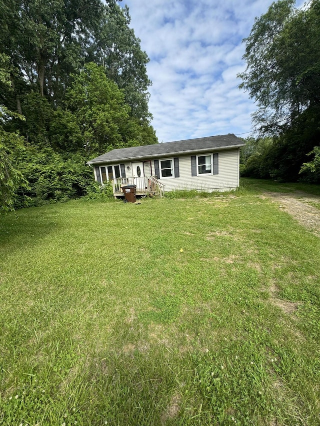 14300 Tuttlehill, Milan, MI 48160 - ranch-style home with a front yard