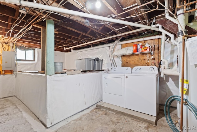 203 S Main St, Onsted, MI 49265 - laundry room featuring electric panel and independent washer and dryer