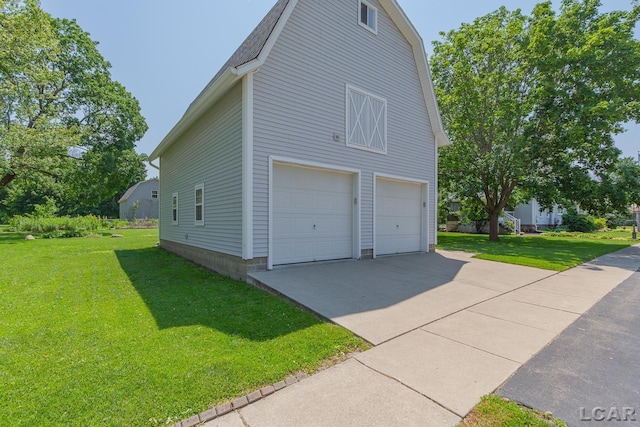 203 S Main St, Onsted, MI 49265 - view of side of property with a yard and a detached garage