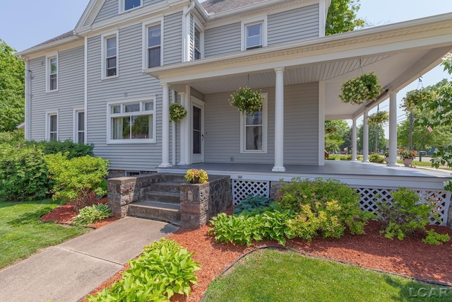 203 S Main St, Onsted, MI 49265 - view of front facade with a porch