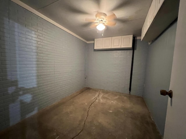 7428 Ansley Ln, Hillsdale, MI 49242 - finished basement with a ceiling fan and brick wall