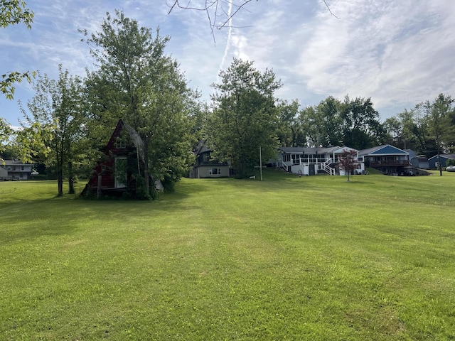 7428 Ansley Ln, Hillsdale, MI 49242 - view of green lawn featuring view of scattered trees