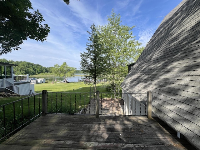 7428 Ansley Ln, Hillsdale, MI 49242 - wooden terrace featuring a water view, a lawn, and stairway