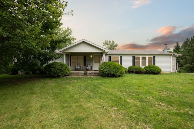 9792 Hastings Rd, Jackson, MI 49201 - single story home with a porch and a front yard