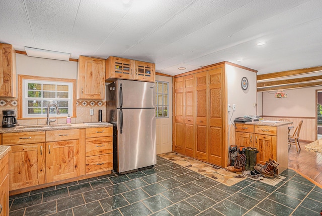 8933 E M 20, Hesperia, MI 49421 - kitchen featuring freestanding refrigerator, tasteful backsplash, recessed lighting, light stone countertops, and crown molding
