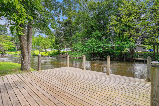 8933 E M 20, Hesperia, MI 49421 - dock with a water view and view of scattered trees