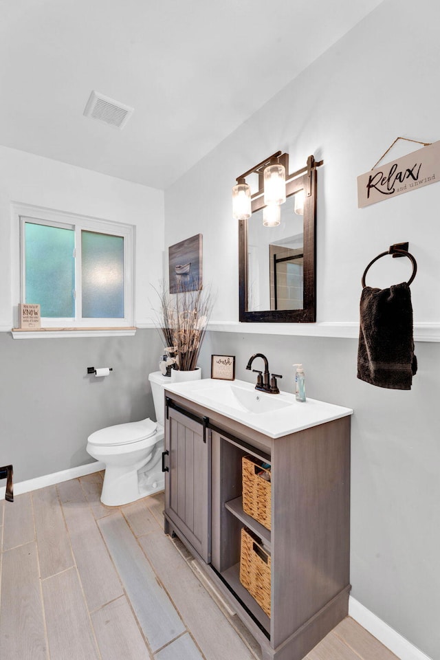 29206 Guy St, Southfield, MI 48076 - bathroom featuring vanity and wood finished floors