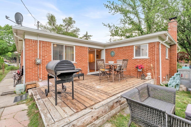 29206 Guy St, Southfield, MI 48076 - wooden deck with outdoor dining space and area for grilling