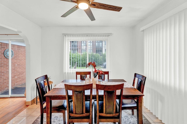 29206 Guy St, Southfield, MI 48076 - dining room with ceiling fan, arched walkways, and light tile patterned floors