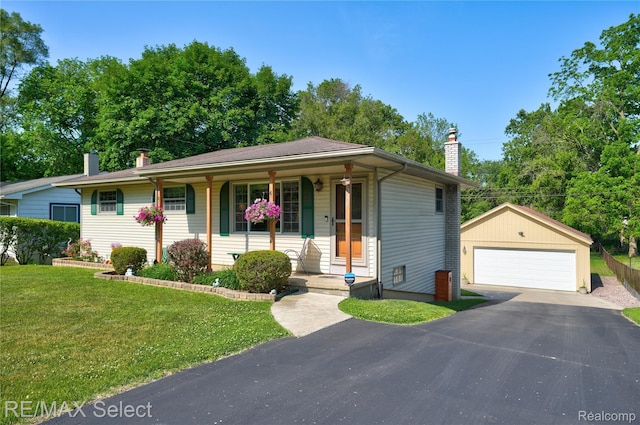 2249 Pauline Dr, Waterford, MI 48329 - view of front of property with a chimney, an outbuilding, a porch, a detached garage, and a front lawn