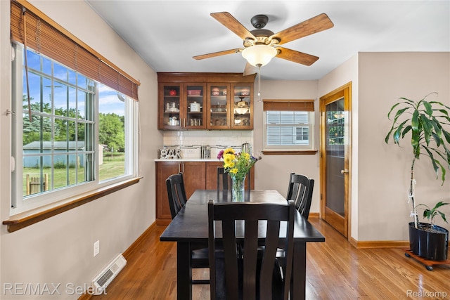 2249 Pauline Dr, Waterford, MI 48329 - dining area with light wood finished floors and ceiling fan