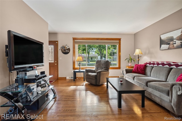 2249 Pauline Dr, Waterford, MI 48329 - living room featuring wood finished floors and baseboards