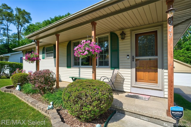 2249 Pauline Dr, Waterford, MI 48329 - entrance to property with a porch and a garage