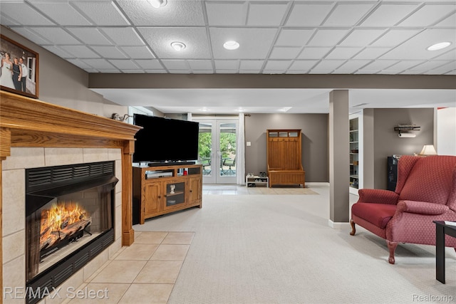 2249 Pauline Dr, Waterford, MI 48329 - living room featuring a fireplace, light colored carpet, light tile patterned floors, and recessed lighting