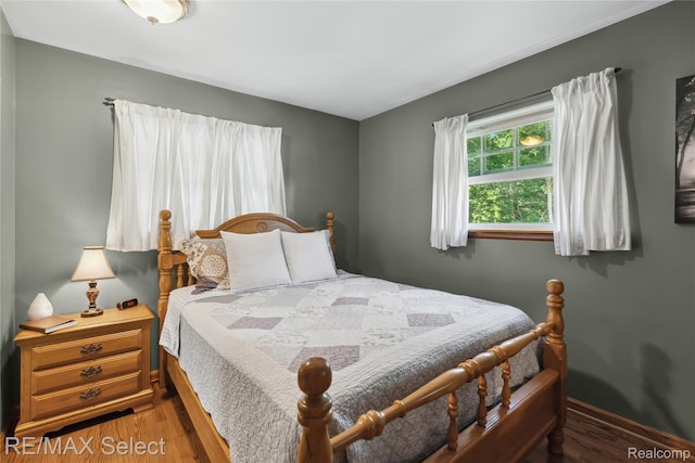 2249 Pauline Dr, Waterford, MI 48329 - bedroom with wood finished floors