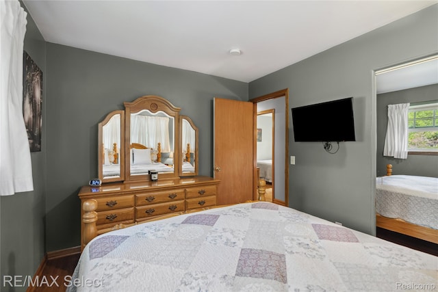2249 Pauline Dr, Waterford, MI 48329 - bedroom with wood finished floors and baseboards