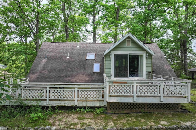 7199 Switzer Dr, Linden, MI 48451 - back of property with roof with shingles and a wooden deck