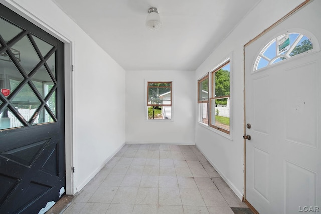 306 S Washington St, Manchester, MI 48158 - foyer entrance featuring healthy amount of natural light and light tile patterned flooring