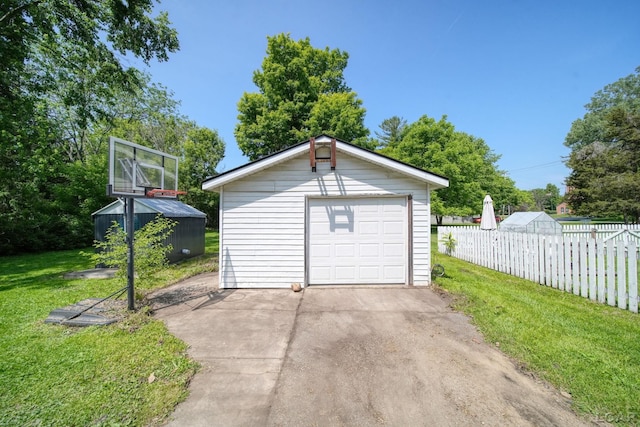 306 S Washington St, Manchester, MI 48158 - detached garage with concrete driveway