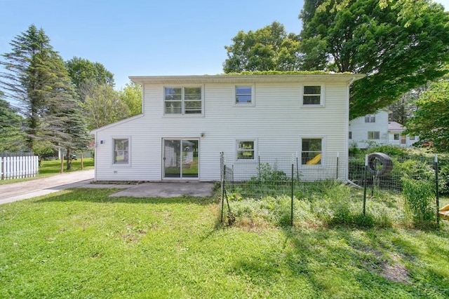 306 S Washington St, Manchester, MI 48158 - rear view of property with a patio area