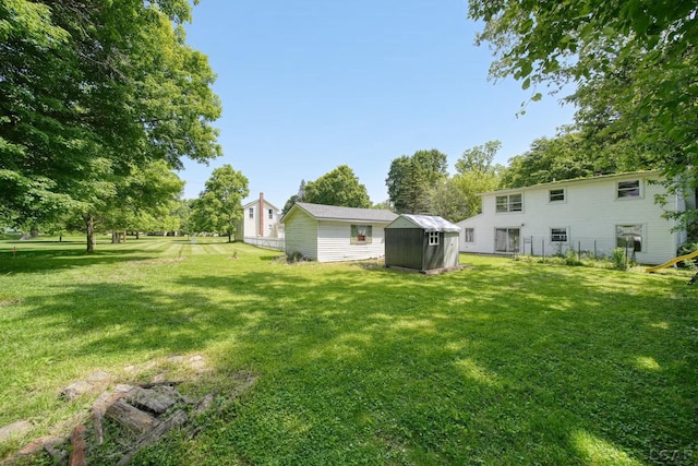 306 S Washington St, Manchester, MI 48158 - view of yard featuring a storage shed