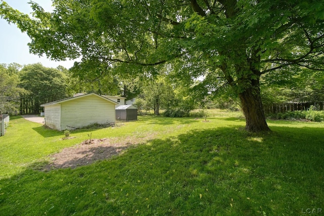 306 S Washington St, Manchester, MI 48158 - view of yard featuring a shed