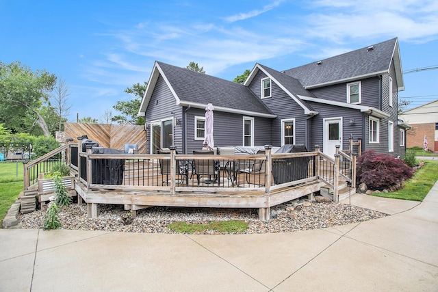 325 Marshall St, Coldwater, MI 49036 - rear view of house featuring roof with shingles and a deck