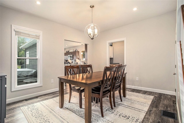 325 Marshall St, Coldwater, MI 49036 - dining area with a chandelier, wood finished floors, and recessed lighting