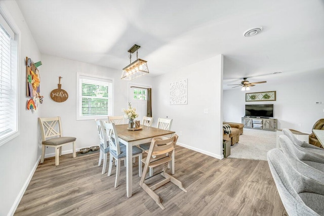 54727 Twin Lakes Rd, Dowagiac, MI 49047 - dining area with light wood-style floors and ceiling fan